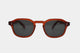 Elevate your style with Frantistek Sunglasses in Rust Orange. Crafted meticulously from sustainable Mazzucchelli bioacetate, these shades redefine eco-luxury. Their classic retro frame transcends trends, embodying timeless elegance. Size: 49mm-23mm, Temple: 145mm. Make a responsible fashion choice and embrace enduring style- front angle