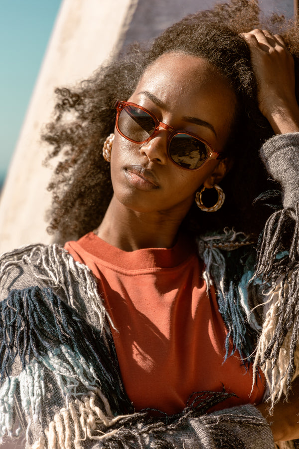 aloos eyeweare campagin muhler colection feautring famale model wearing frankisteck burnt organe