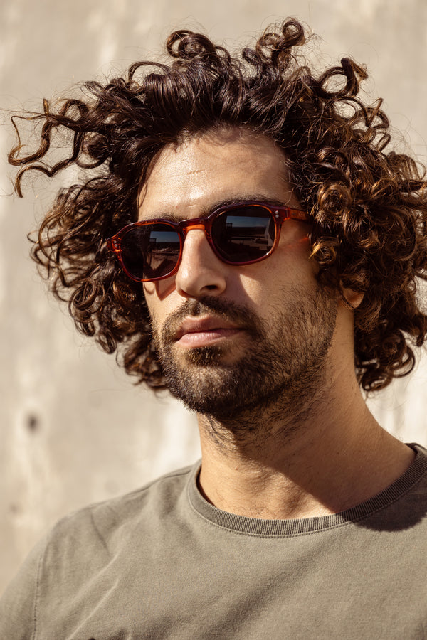 aloos eyeweare campagin muhler colection feautring male model wearing frankisteck burnt organe