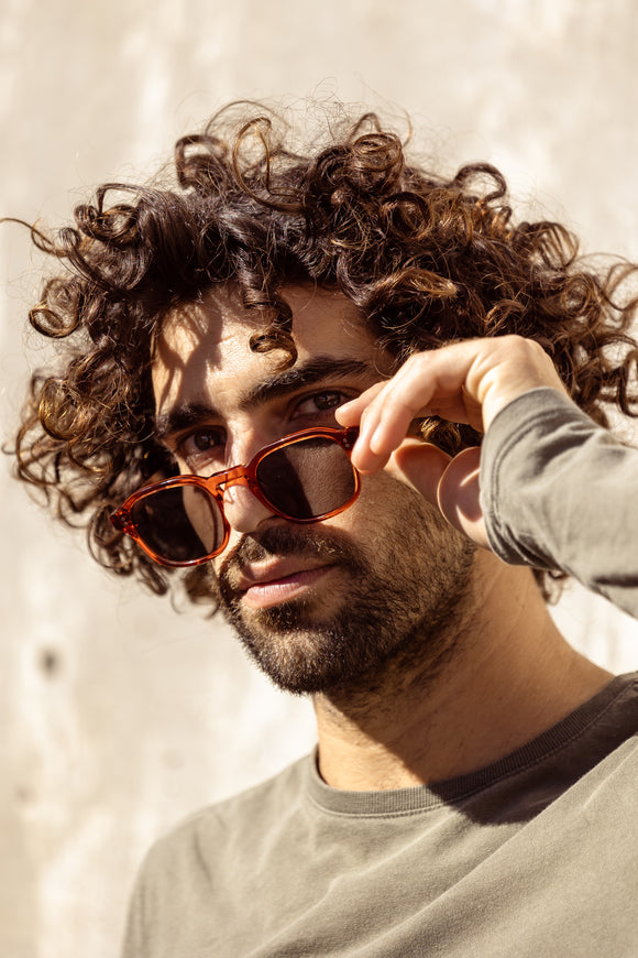 aloos eyeweare campagin muhler colection feautring male model wearing frankisteck burnt organe