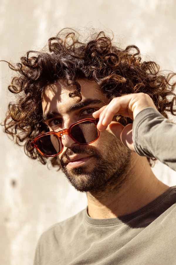 aloos eyeweare campagin muhler colection feautring male model wearing frankisteck burnt organe