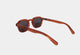 Elevate your style with Frantistek Sunglasses in Rust Orange. Crafted meticulously from sustainable Mazzucchelli bioacetate, these shades redefine eco-luxury. Their classic retro frame transcends trends, embodying timeless elegance. Size: 49mm-23mm, Temple: 145mm. Make a responsible fashion choice and embrace enduring style-  back angle